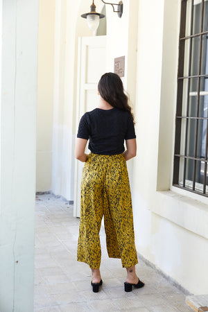 מכנסיים אוליביה בצבע צהוב הדפס מזוברר